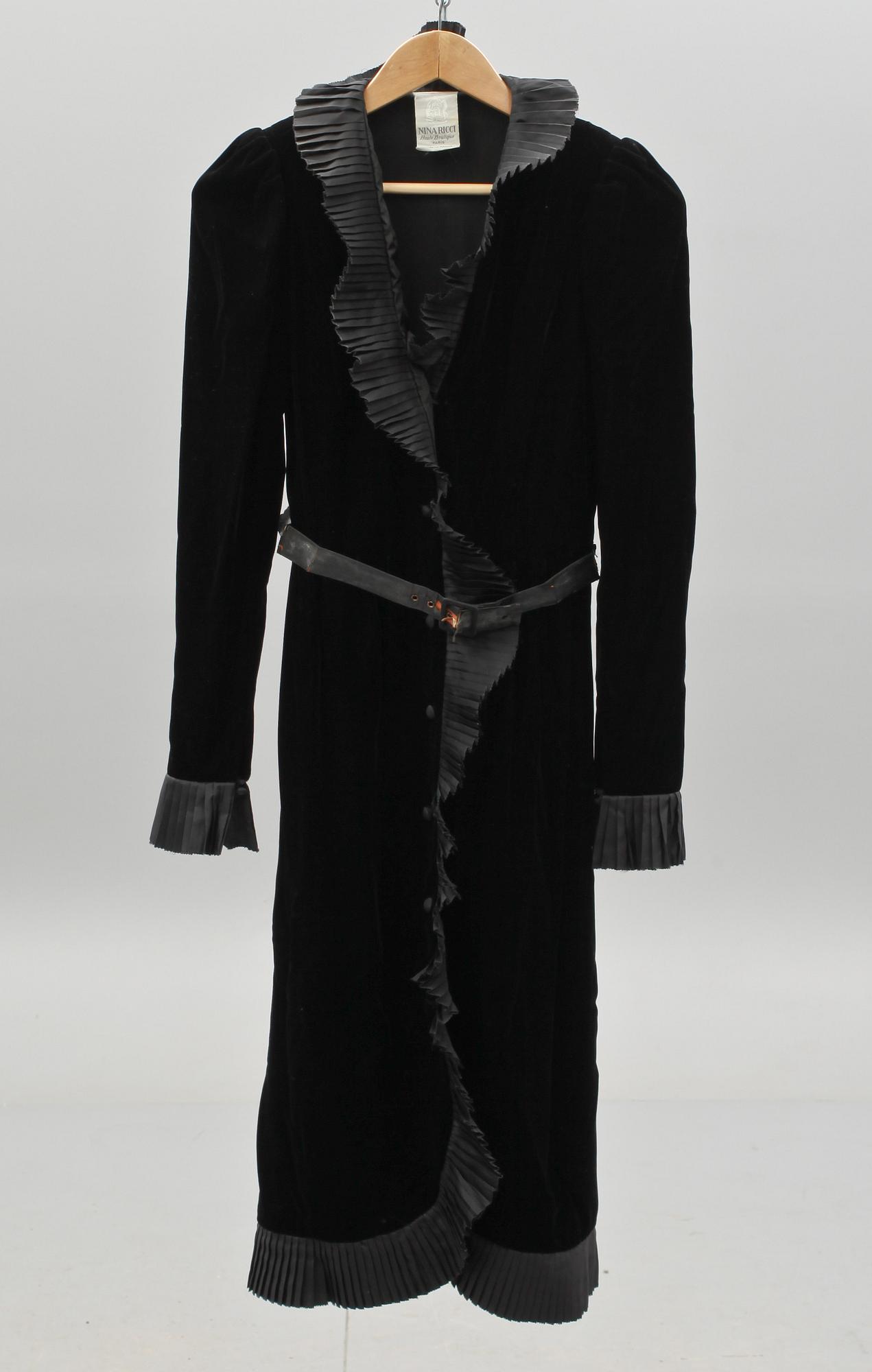 NINA RICCI, a black velvet dress.