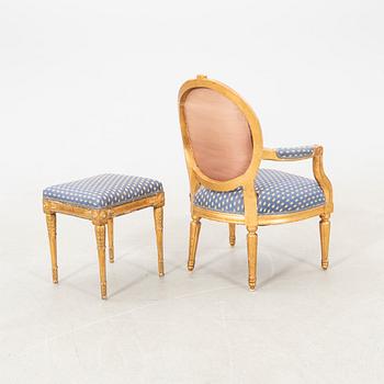 Armchair in the Gustavian style, circa 1800, and a tabouret in the Gustavian style, 20th century.