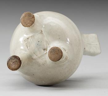 A pale grey-bluish glazed tripod censer with decor in relief, and archaistic mark, Ming dynasty (1368-1644).