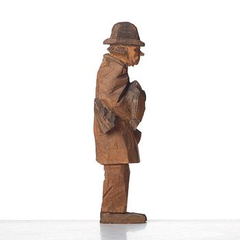 Axel Petersson Döderhultarn, Man holding boots.