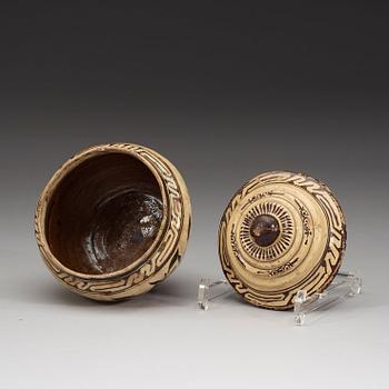 A Cizhou ware pot with cover, presumably Yuan dynasty (1260-1370).