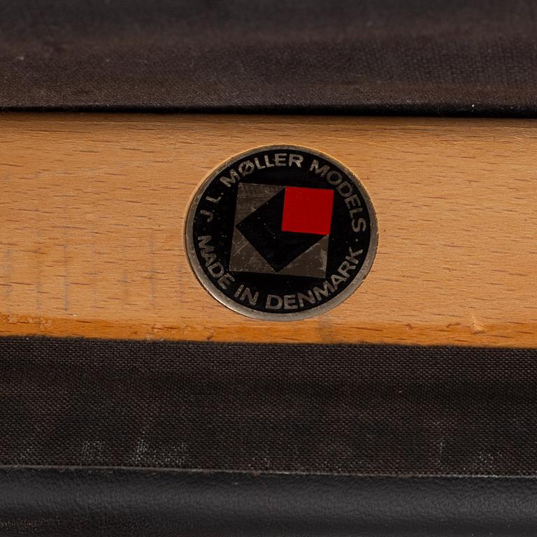 Niels Otto Møller, a rosewood dining table and eight rosewood chairs, Poul Jeppesen & JL Möller, Denmark, 1960's.