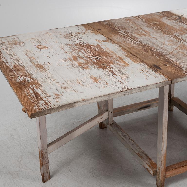 A painted gate leg table, 19th Century.