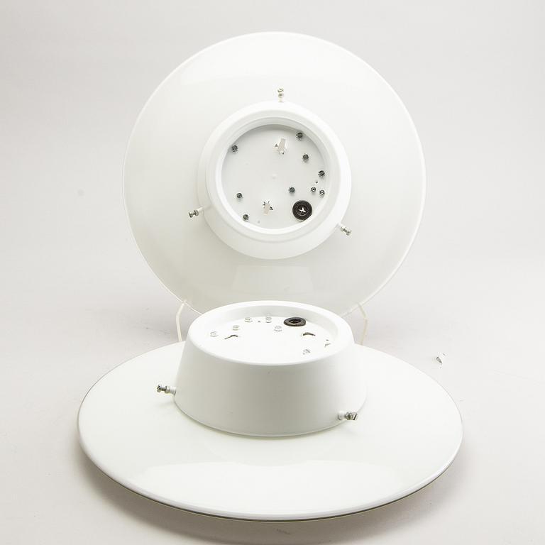 ARNE JACOBSEN, a pair of wall/ceiling lights, 'AJ Eklipta', Louis Poulsen, Denmark.