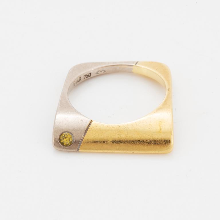 Ring med gul briljantslipad diamant.