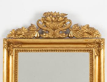 A mid 19th century mirror sconce.