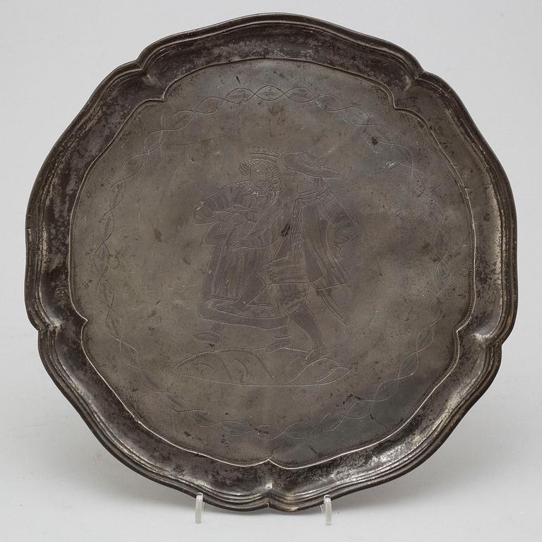 A GERMAN PEWTER PLATE, marked 1710.