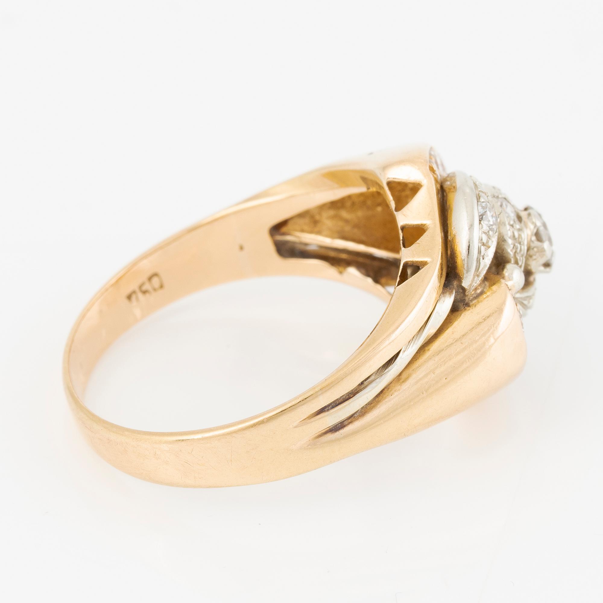 Ring, 18K guld med briljantslipade diamanter.