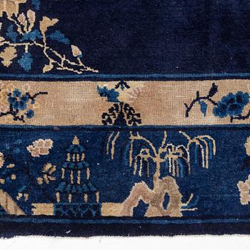 An antique Beijing carpet, northern China, approx. 287 x 239 cm.