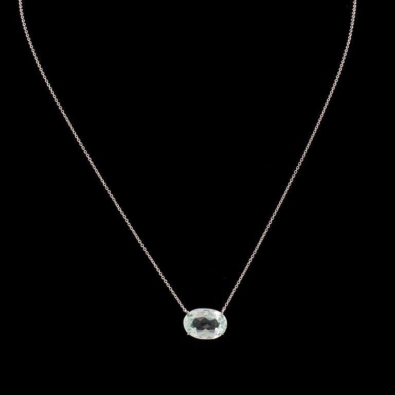 An 18K white gold necklace with an oval faceted aquamarine.