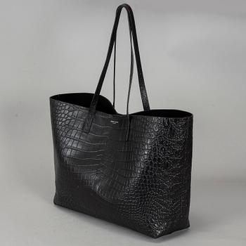 YVES SAINT LAURENT, a black patent leather shopper.
