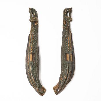 A pair of carved horse harness parts, 18th / 19th century.