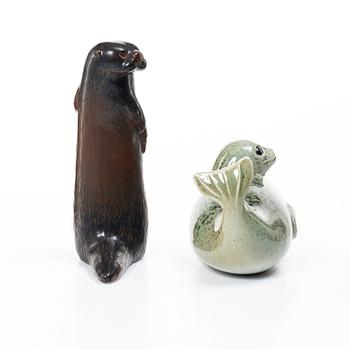 Lisa Larson, a 'Pilgrimsfalk' and 'Bison' figurine, Gustavsberg for NK, Nordiska Kompaniet in collaboration with WWF.