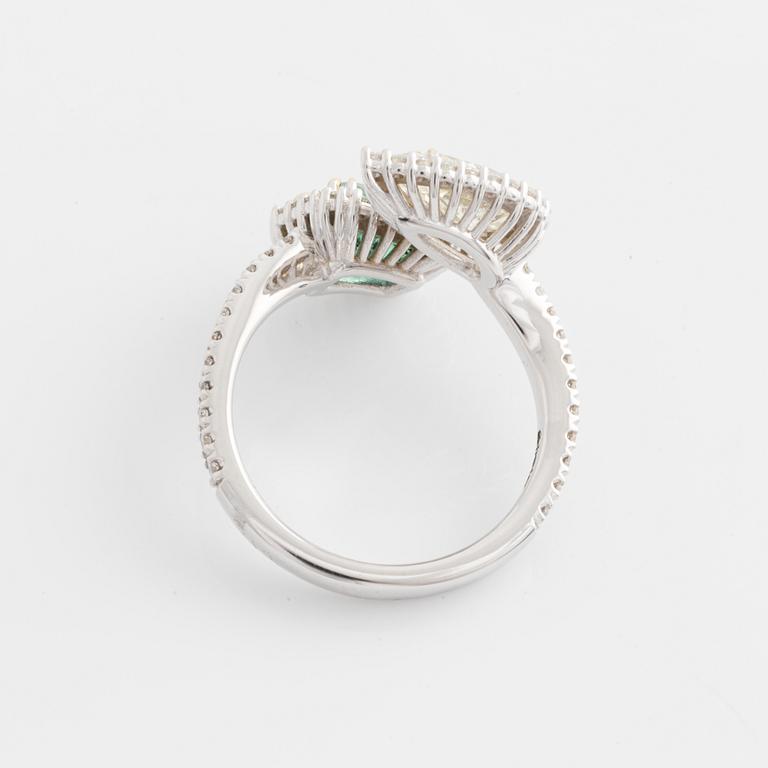 Ring with emerald-cut emerald and pear-shaped diamond, accompanying GIA diamond report.