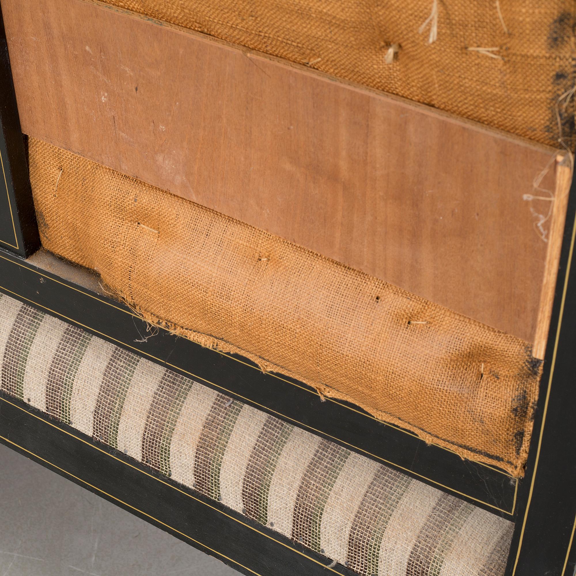 A gustavian style table and sofa, around the year 1900.