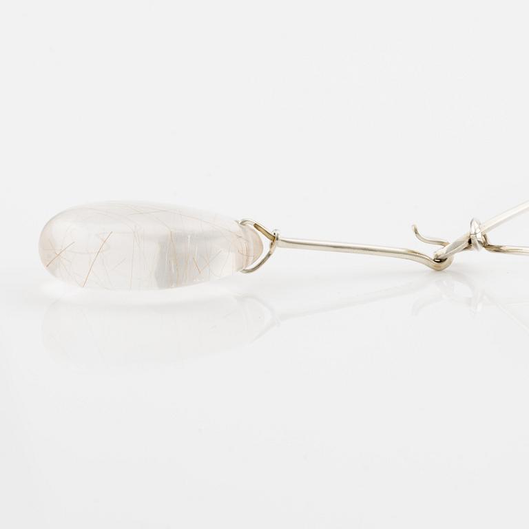 Vivianna Torun Bülow-Hübe, a neck ring no. 160 with pendant no. 131 in rutilated quartz, sterling silver, for Georg Jensen, Denmark.