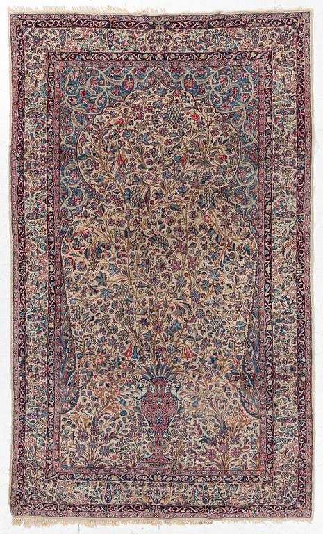 A semi antique Kirman rug, South Persia, c. 228 x 136 cm.
