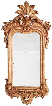 562. A Rococo 18th century mirror.