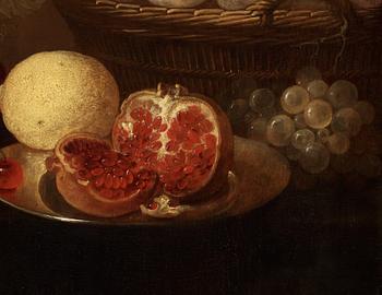 Jan van den Hecke d.ä, Still life with a silver beaker, oysters, pomegranate, cherries and grapes.