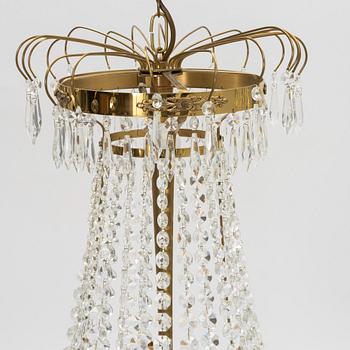 A contemporary Empire style chandelier for eight candles.