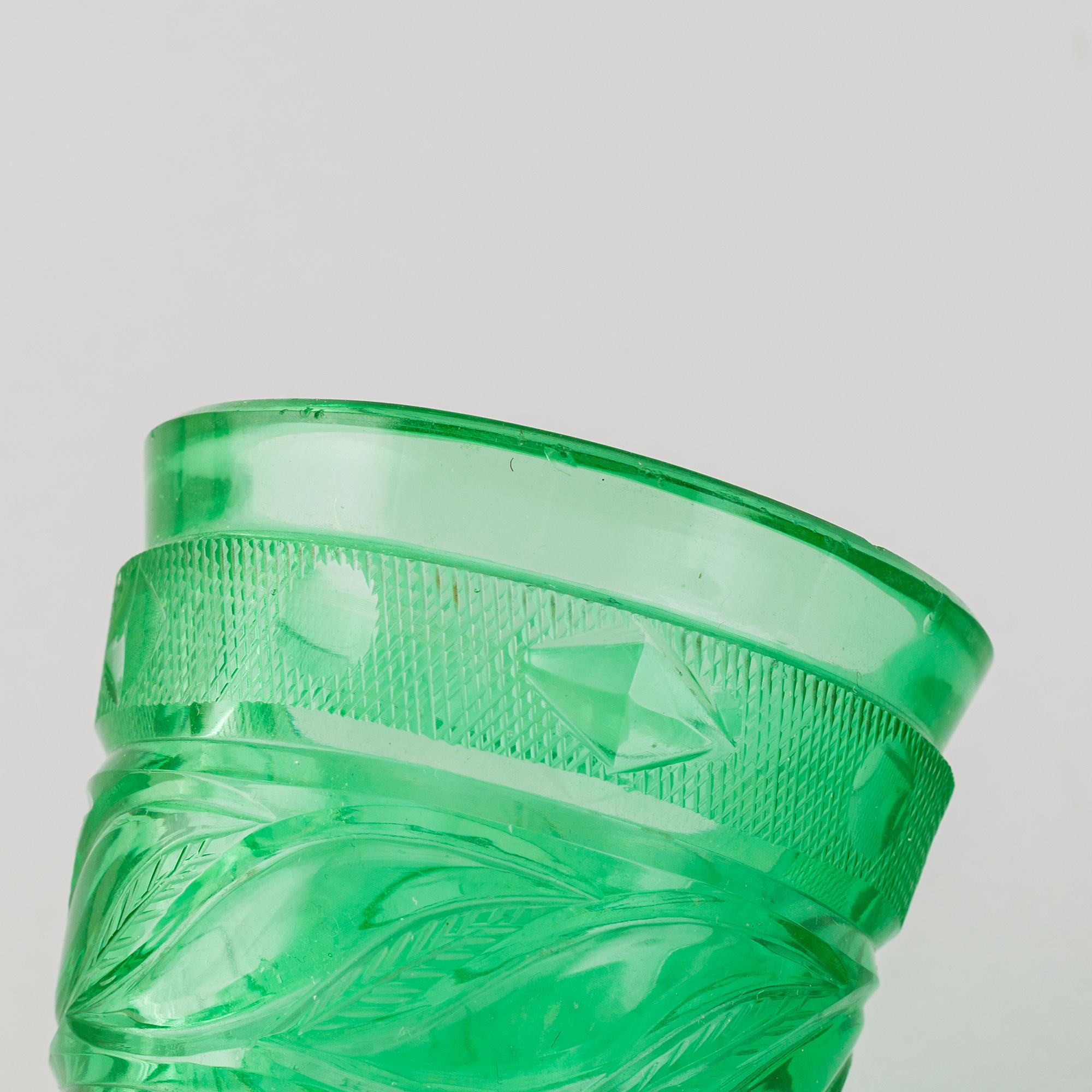 A green tinted cut vodka glass, Russia, Imperial glass manufactory, St Petersburg, 19th Century.