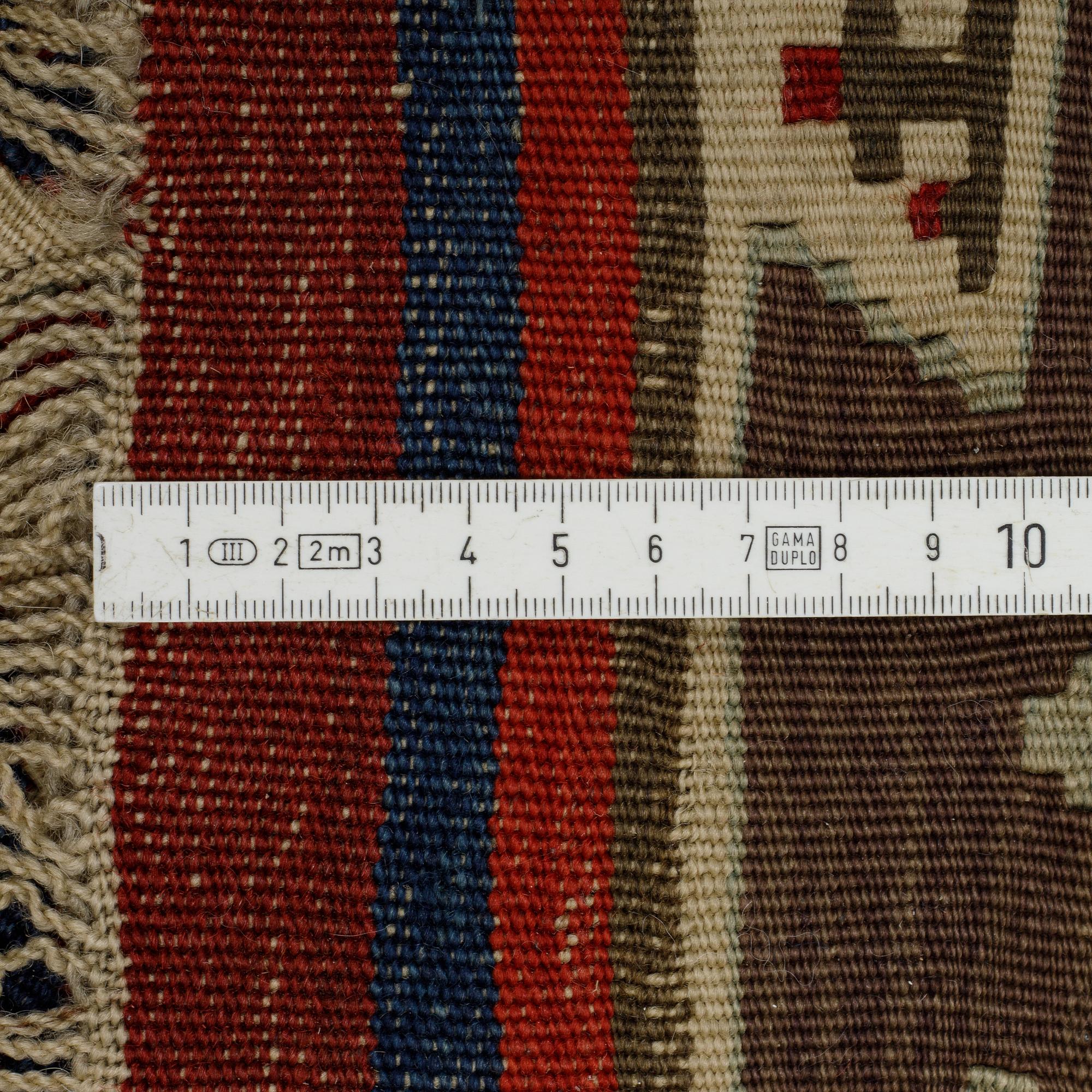 A carpet, a kilim, an antique Anatolian, ca 310-326 x 183,5-192 cm.