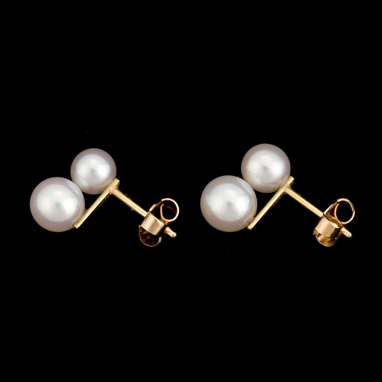 A pair of earrings with cultured pearls.