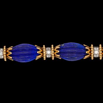 A Van Cleef & Arpels gold, lapis lazuli and brilliant cut diamond bracelet, tot. app. 1.50 cts. 1960's.
