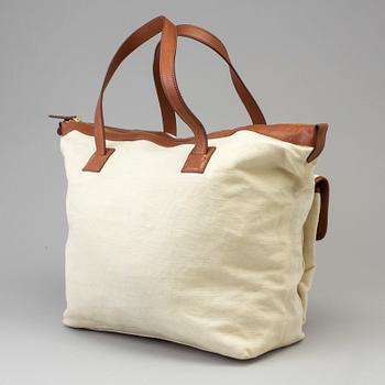 A white canvas and leather proprietor bag by Ralph Lauren.
