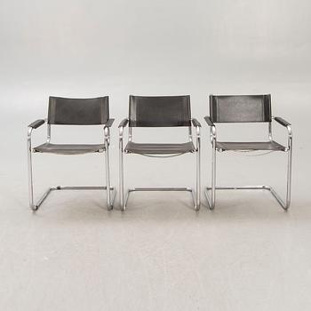 A set of five similar Italian 1970s chrome and leather armchairs.