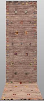 A Kelim runner carpet, 300 x 82 cm.