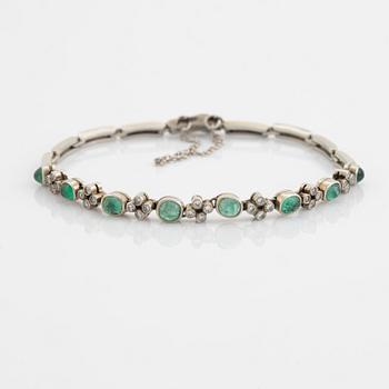 18K white gold and cabochon cut emerald and eight cut diamond bracelet.