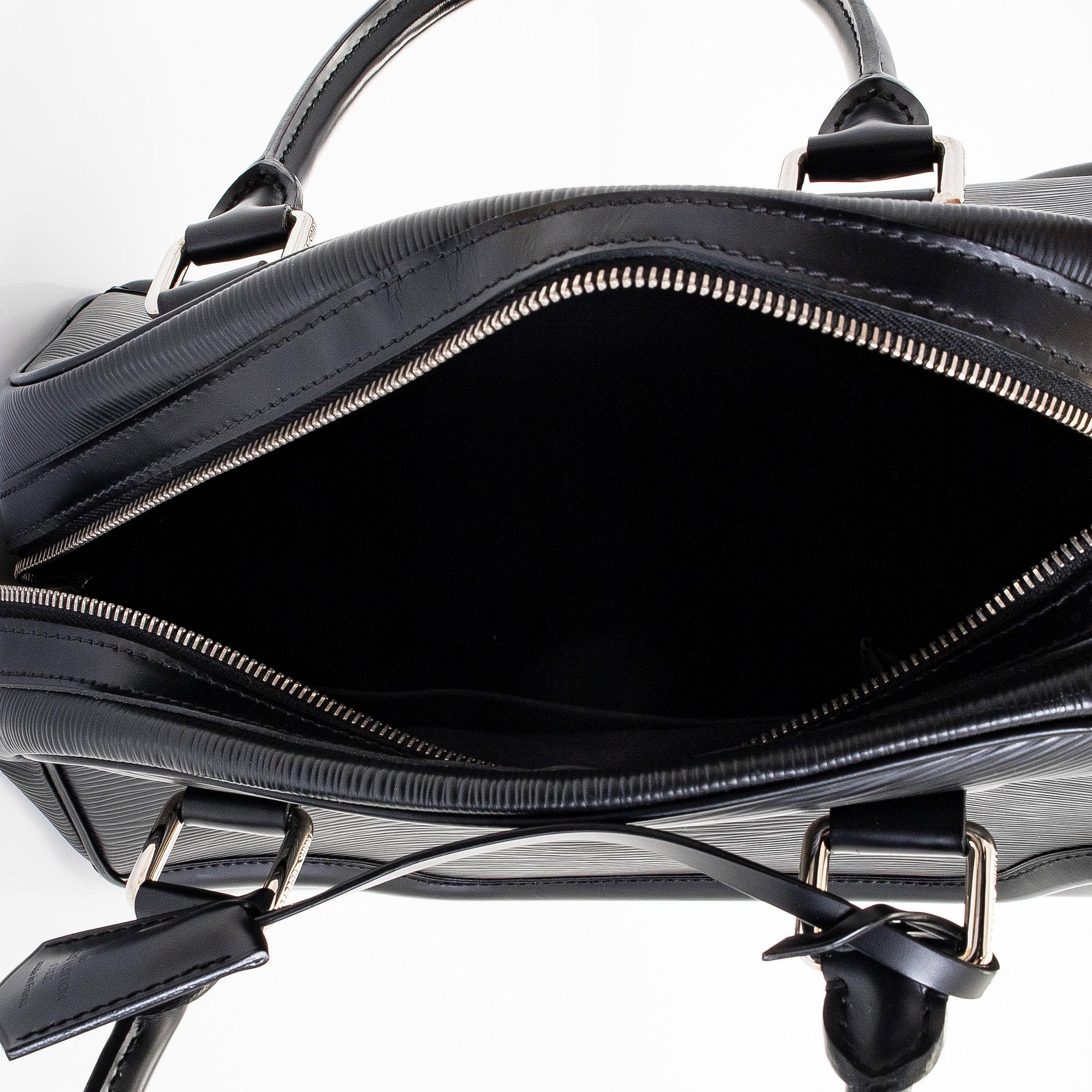 Louis Vuitton, An 'Epi Montaigne PM' bag.