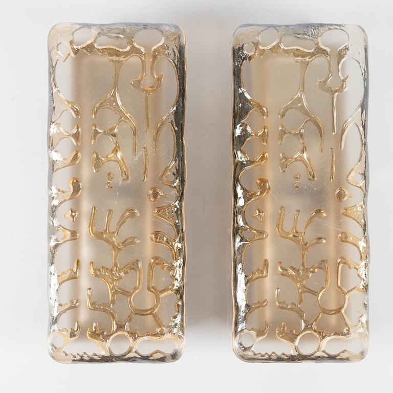 A pair of glass wall lamps by Peill & Putzler, second half of the 20th century.