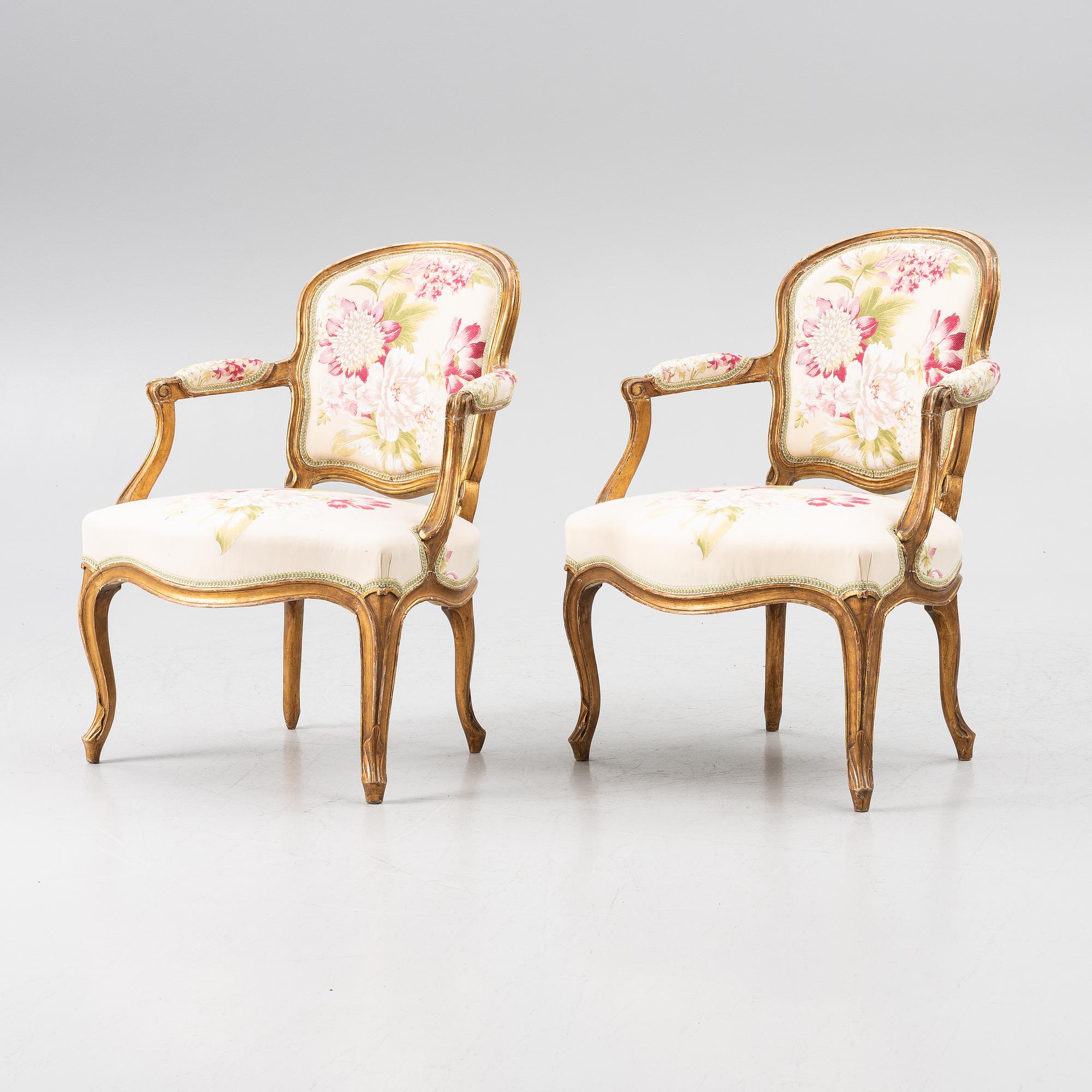 A pair of presumably French Louis XV armchairs, mid 18th century.