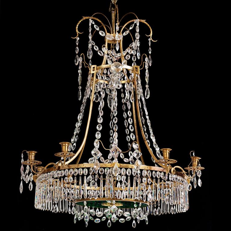 A German Louis XVI ormolu and cut-glass nine-light chandelier attributed to Johann Christoph Ermisch, late 18th century.