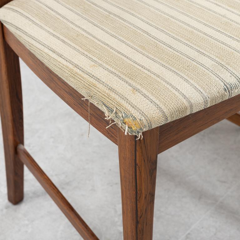 A 1960's/70's rosewood veneered dining group.