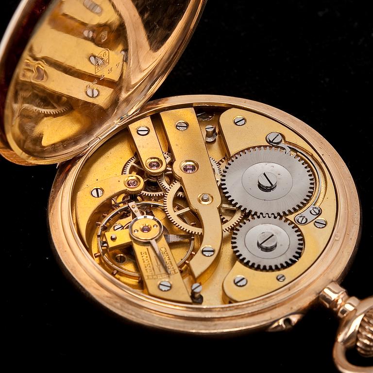 A POCKET WATCH WITH CHATELAINE.