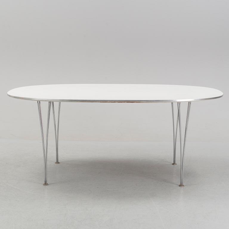 A 'Super elliptical' dining table by Bruno Mathsson & Piet Hein for Fritz Hansen, dated 1995.