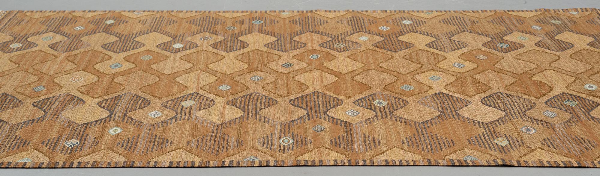 Barbro Nilsson, A carpet, "Finspong, lättbrun" ("Kringelikroka"), flat weave, ca 298 x 203-204 cm, signed AB MMF BN.