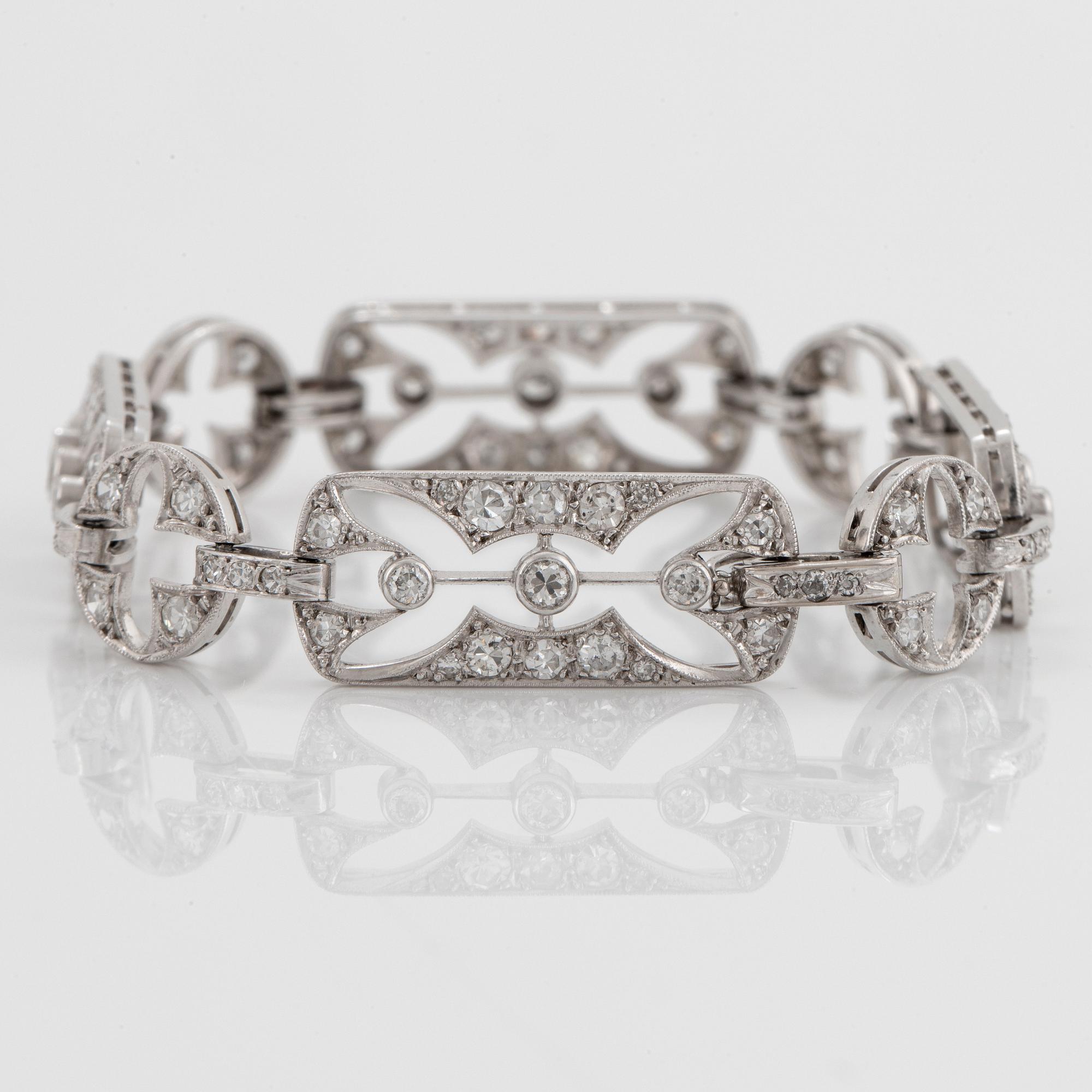 Armband platina med gammal- och åttkantslipade diamanter samt medföljande ring.