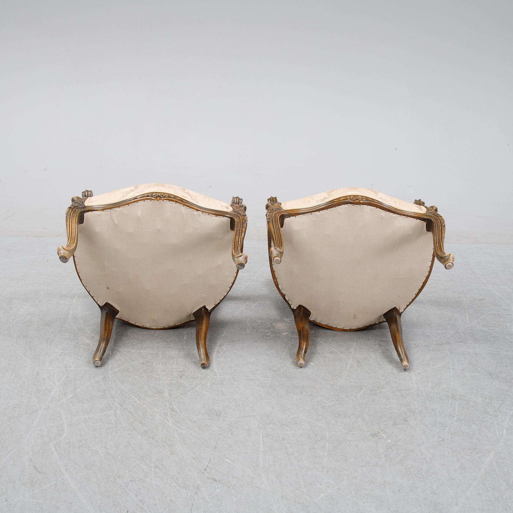 A pair of Louis XV-style arm chairs, 20th century.