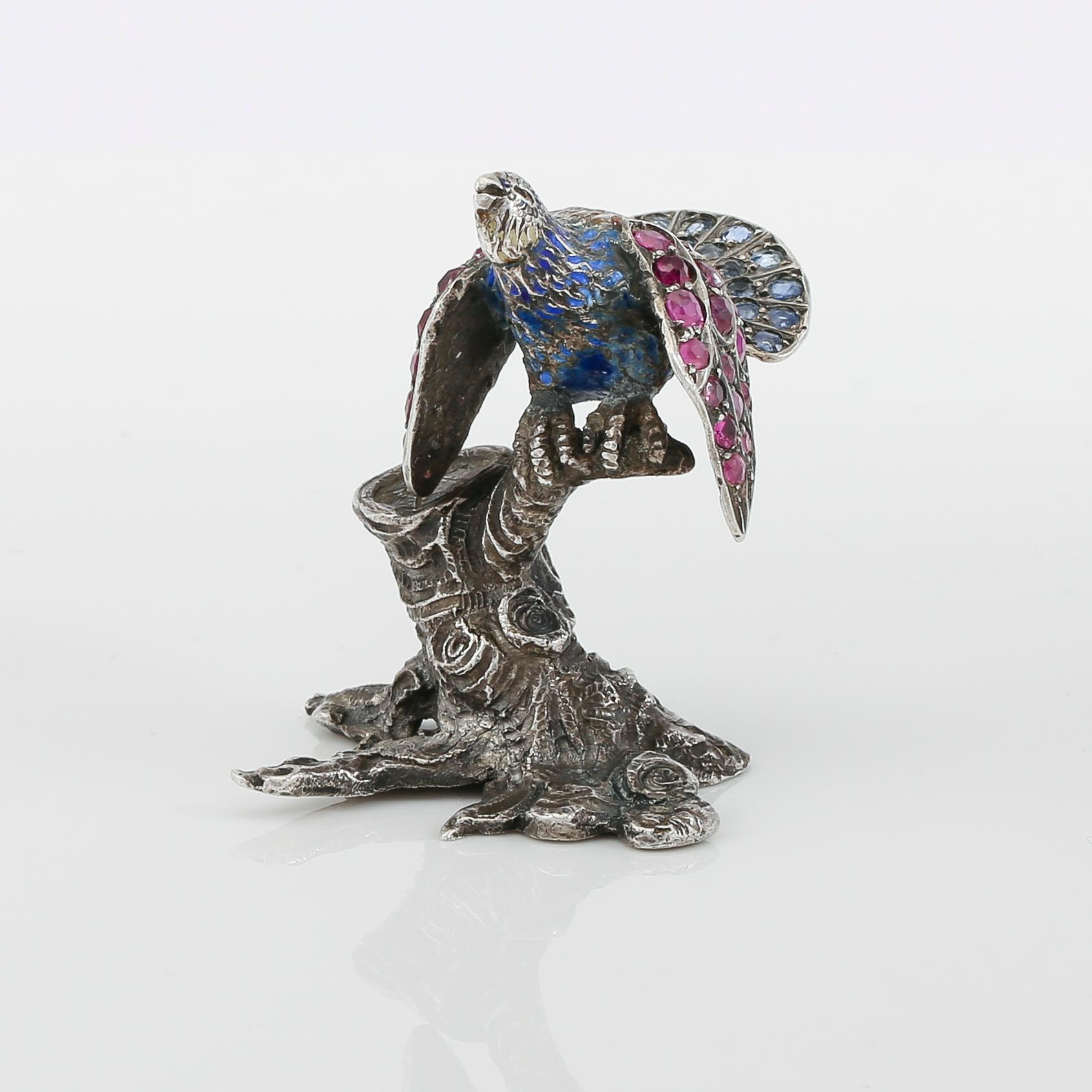 FIGUR, silver, emalj, rubiner och safirer, 1900-talets första hälft. Vikt ca 33 gram.