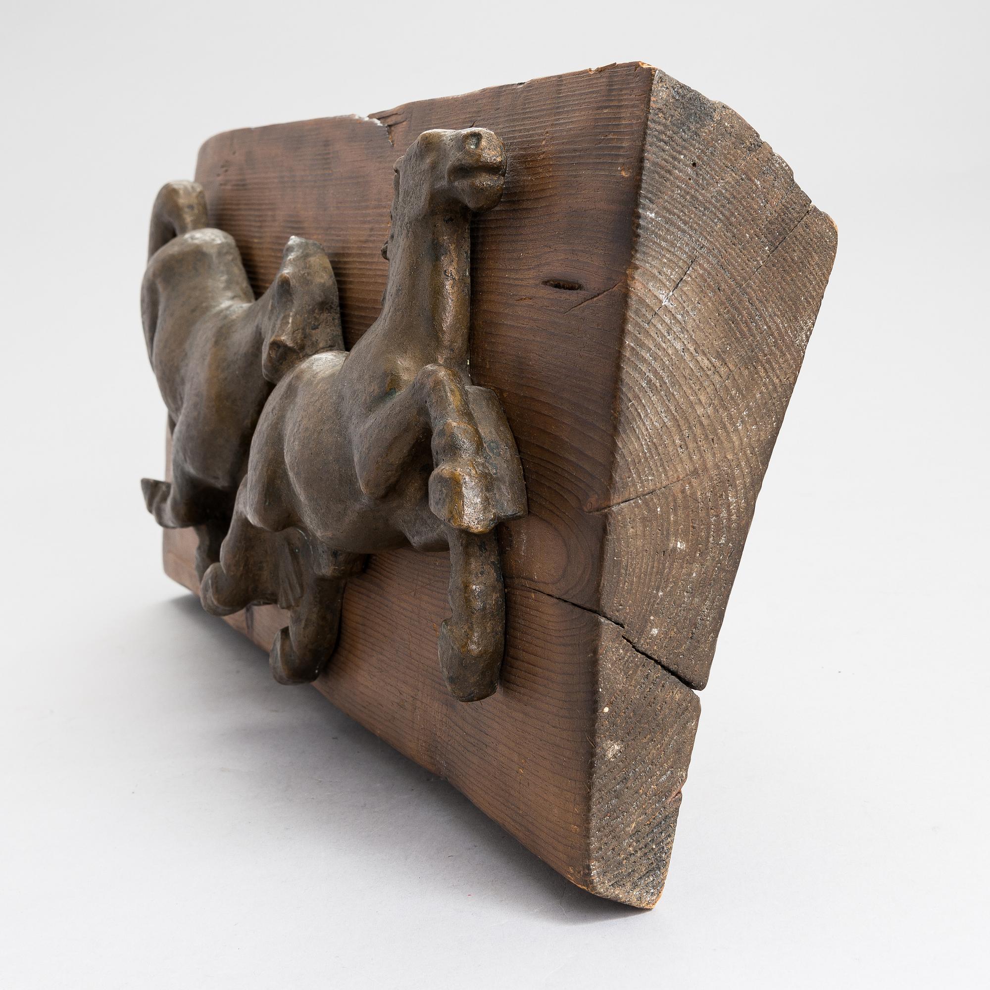 Oskari Jauhiainen, relief, bronze and wood.