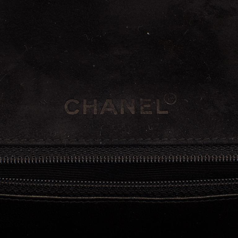 A CHOCO BAR SUEDE FLAP BAG BY CHANEL.