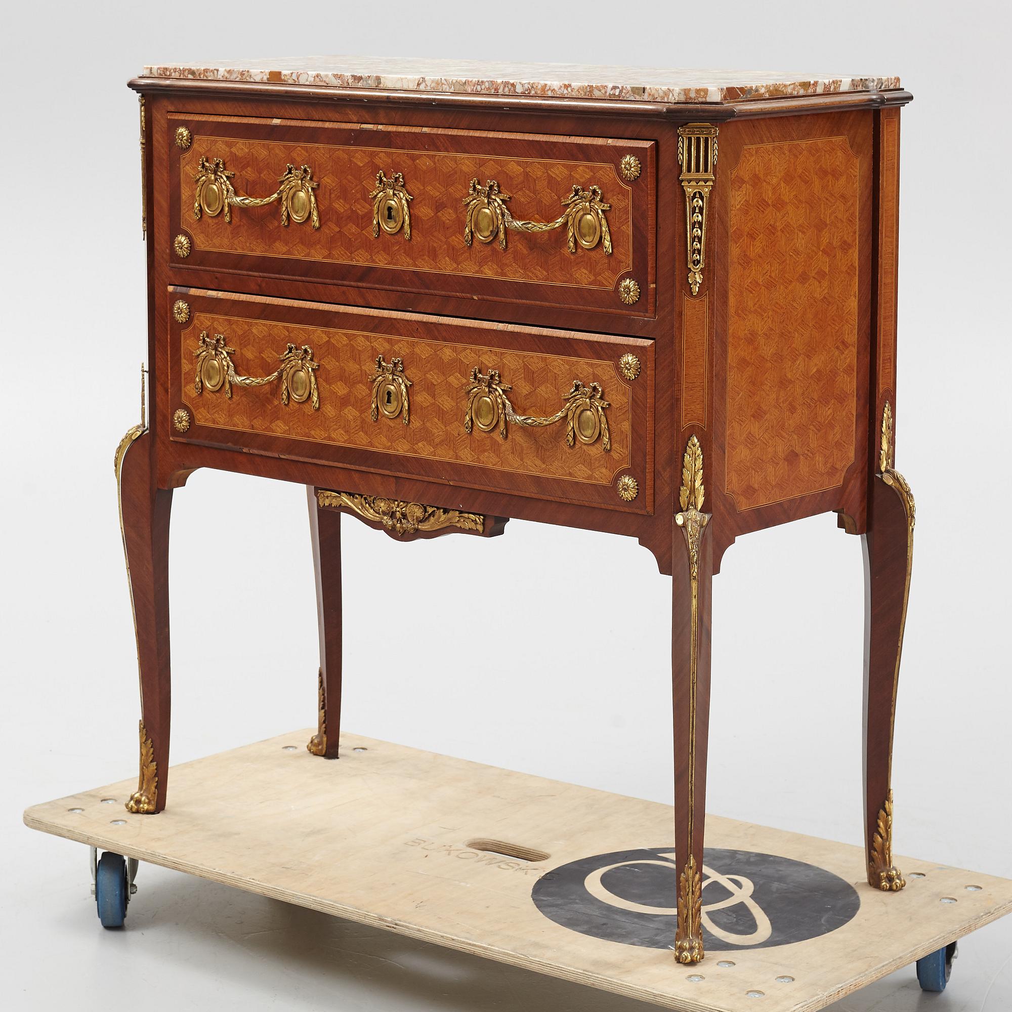 A Louis XVI-style bureau from the second half of the 20th century.