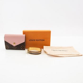 Louis Vuitton, Plånbok "Zoe" samt armband.