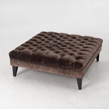 A pouf, contemporary.