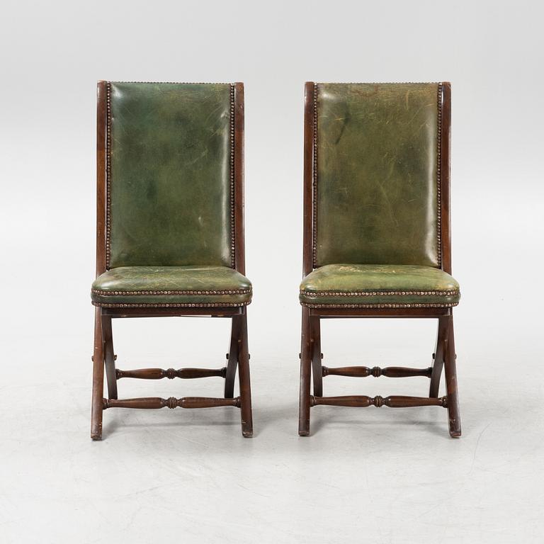 A set of five mahogany and leather upholstered chairs, England, second half of the 20th Century.