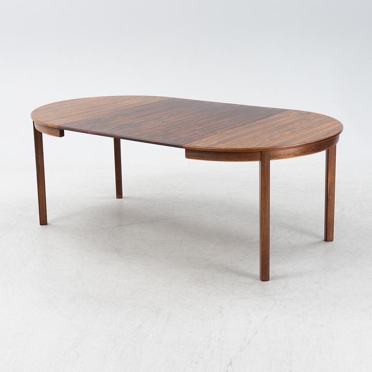 A 1960's/70's rosewood veneered dining group.